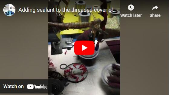 Adding sealant to the threaded cover plate